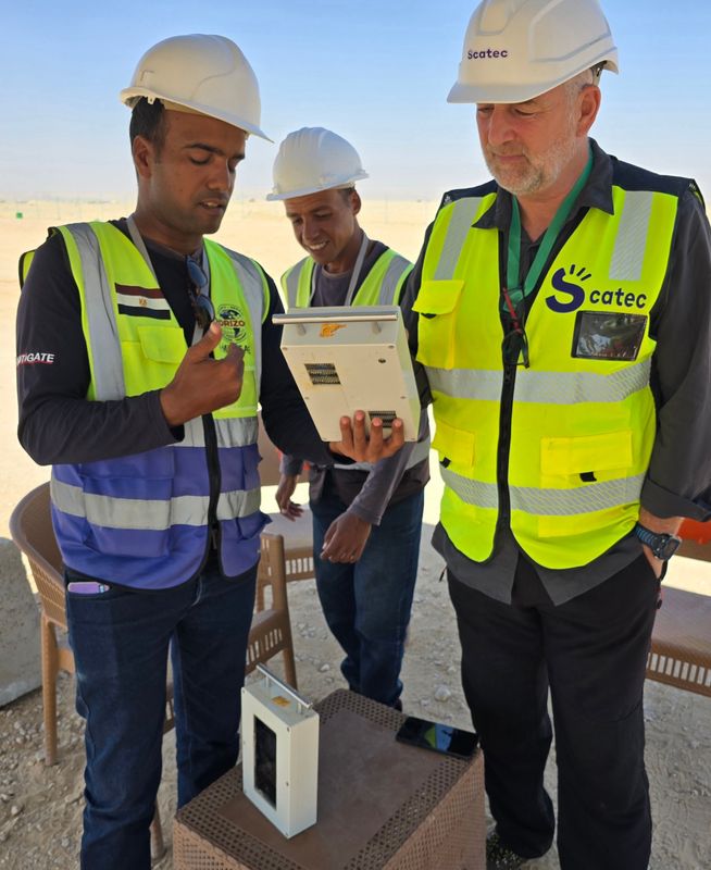 Site team reviewing equipment on a solar project